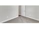 Neutral bedroom with carpet, showcasing a peaceful retreat for relaxation and rest at 125 Davis St, Louisburg, NC 27549