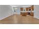 Spacious kitchen with wooden cabinetry, island, and stainless steel appliances provides a modern culinary space at 125 Davis St, Louisburg, NC 27549