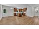 Updated kitchen features a breakfast bar, stainless steel appliances, and ample cabinet space for storage at 125 Davis St, Louisburg, NC 27549