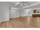 Open living space flows seamlessly into the kitchen, promoting connectivity and easy entertaining at 125 Davis St, Louisburg, NC 27549