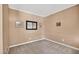 Cozy bedroom with neutral carpeting, crown molding, and ample natural light from a window at 1437 Lindenberg Sq, Wake Forest, NC 27587