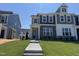 Charming townhome with stone accents and a well-manicured lawn in a desirable neighborhood at 1563 Wendell Valley Blvd, Wendell, NC 27591