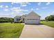 Charming single-Gathering home with well-manicured lawn and attached two-car garage at 174 Arrow Ln, Middlesex, NC 27557