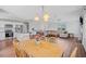 Open concept view of the dining room and Gathering room with hardwood flooring at 174 Arrow Ln, Middlesex, NC 27557