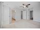 Spacious Primary bedroom with an en-suite bathroom, carpeted floors, and natural light at 174 Arrow Ln, Middlesex, NC 27557