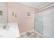 Bathroom featuring a vanity with a sink and a shower with glass doors at 1822 Atterbury Ln, Durham, NC 27712