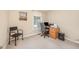 Bright home office with a desk, chair, and window, perfect for remote work or study at 1822 Atterbury Ln, Durham, NC 27712