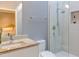 Bathroom featuring a glass-enclosed shower, vanity, and modern fixtures at 1908 S Lakeshore Dr, Chapel Hill, NC 27514
