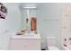 Stylish bathroom with marble vanity, modern fixtures, and combined tub and shower at 1908 S Lakeshore Dr, Chapel Hill, NC 27514