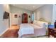 Bedroom featuring natural light, hardwood floors, and comfortable furnishings at 1908 S Lakeshore Dr, Chapel Hill, NC 27514