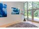 Bright entryway featuring a zebra rug, unique decor, and views to the front yard at 1908 S Lakeshore Dr, Chapel Hill, NC 27514