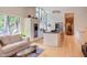 Open living area and kitchen with stainless steel appliances and plenty of natural light at 1908 S Lakeshore Dr, Chapel Hill, NC 27514