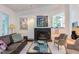 Spacious living area with fireplace, comfortable seating, and seamless transition to other areas at 1908 S Lakeshore Dr, Chapel Hill, NC 27514
