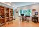 Spacious office with large window, built in shelving, and outside access at 1908 S Lakeshore Dr, Chapel Hill, NC 27514
