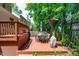 Inviting back deck with outdoor seating area, ideal for enjoying meals outdoors and a cozy atmosphere at 208 Silk Hope Dr, Cary, NC 27519