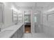 Stylish bathroom features a double sink vanity and a luxurious glass-enclosed shower at 208 Silk Hope Dr, Cary, NC 27519