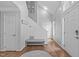 Stylish foyer with hardwood floors, shiplap accent wall, and ample natural light welcomes you home at 208 Silk Hope Dr, Cary, NC 27519