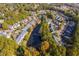 Aerial view of neighborhood with pond in the middle at 2106 White Pond Ct, Apex, NC 27523