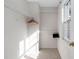 Walk-in closet with wire shelving, carpet floor, and a window offering natural light at 2106 White Pond Ct, Apex, NC 27523