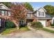 Charming brick-front home with manicured landscaping, attached garage, and beautiful curb appeal at 2106 White Pond Ct, Apex, NC 27523