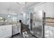 Spacious kitchen flows into living area, featuring stainless steel appliances and granite countertops at 2106 White Pond Ct, Apex, NC 27523