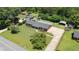 Aerial view highlighting the home's landscaped yard and extended driveway at 2119 Northcrest Dr, Elon, NC 27244