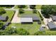 Large backyard including trampoline, covered shelter and additional storage buildings at 2119 Northcrest Dr, Elon, NC 27244