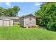 Well-maintained backyard shed offering extra storage space for tools, equipment, and outdoor essentials at 2119 Northcrest Dr, Elon, NC 27244