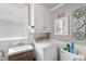 Laundry room features a sink, a toilet, and a new washer at 218 Villa St, Rocky Mount, NC 27804