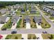 Aerial view of the neighborhood with manicured lawns and tree-lined streets at 22 Combine Trl, Benson, NC 27504