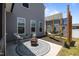 Backyard patio with fire pit, comfortable seating and hammock perfect for entertaining at 22 Combine Trl, Benson, NC 27504