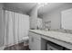 Neat bathroom featuring a vanity with stone countertops and shower-tub combo at 22 Combine Trl, Benson, NC 27504