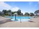 Community pool featuring a splash fountain and plenty of seating at 22 Combine Trl, Benson, NC 27504