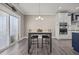 Charming eat-in kitchen with a breakfast table and a sliding glass door at 22 Combine Trl, Benson, NC 27504
