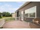 Back porch features wood decking, white railing, grill, and gray siding at 265 Beckwith Ave, Clayton, NC 27527