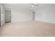 Spacious bedroom features neutral carpet and two walk-in closets at 265 Beckwith Ave, Clayton, NC 27527