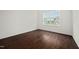 Bedroom with wood-look flooring and a view of the neighborhood at 265 Beckwith Ave, Clayton, NC 27527