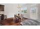 Cozy breakfast nook featuring a small table, a window and sliding glass doors at 265 Beckwith Ave, Clayton, NC 27527