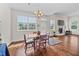 Inviting dining area illuminated by natural light and featuring a decorative fireplace at 265 Beckwith Ave, Clayton, NC 27527