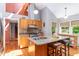 Kitchen with an island and stainless appliances offering both style and functionality at 28 Benchmark, Pittsboro, NC 27312