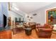 Bright living room featuring vaulted ceilings, skylights and hardwood flooring for an inviting space at 28 Benchmark, Pittsboro, NC 27312
