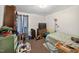 Cozy bedroom featuring a comfortable bed, ample storage, and soft, natural light at 308 E Gilbreath St, Graham, NC 27253