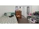 Comfortable bedroom with a cozy bed, dresser, and natural light at 308 E Gilbreath St, Graham, NC 27253