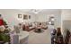 Inviting living room featuring a cozy sectional and a ceiling fan at 308 E Gilbreath St, Graham, NC 27253