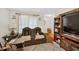 Living room view showcasing a comfortable brown reclining sofa and stylish decorative accents at 308 E Gilbreath St, Graham, NC 27253