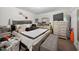 Comfortable main bedroom with a large bed, matching dressers, and soft lighting at 308 E Gilbreath St, Graham, NC 27253