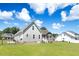 Spacious backyard enclosed by a black fence at 308 Nashville Dr, Archer Lodge, NC 27527