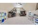 Bedroom featuring an office space, pitched ceiling with a ceiling fan and carpet flooring at 308 Nashville Dr, Archer Lodge, NC 27527