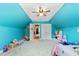 Spacious bedroom featuring a pitched ceiling with a ceiling fan and carpet flooring at 308 Nashville Dr, Archer Lodge, NC 27527