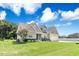 Beautiful home with a two-car garage and a well-maintained lawn at 308 Nashville Dr, Archer Lodge, NC 27527